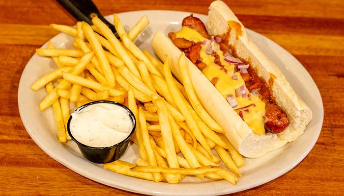 Delicious sausage on a French roll served with fries at Wurst Bier Hall in West Fargo ND.